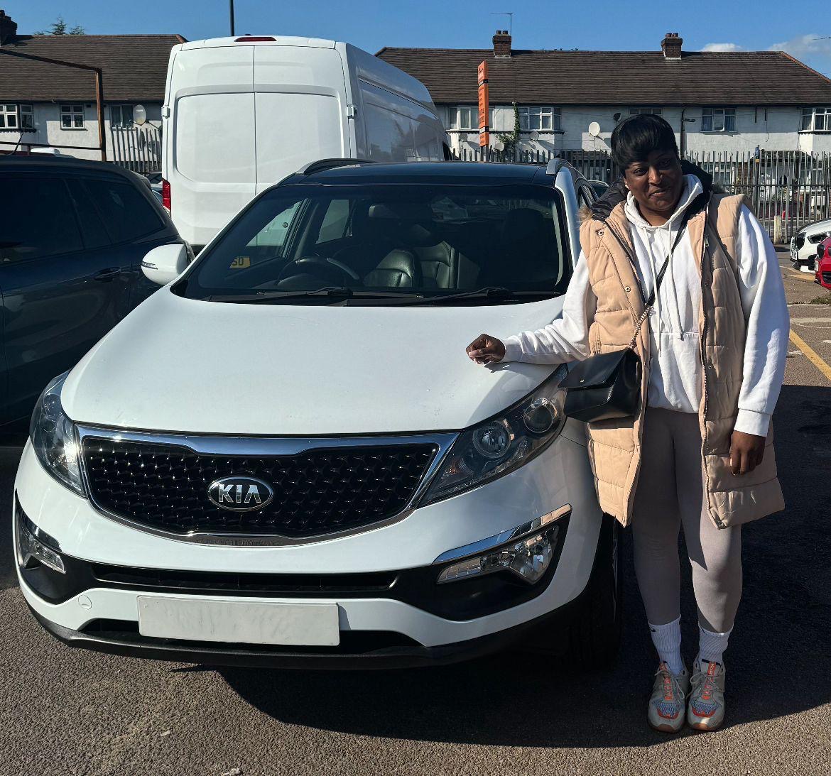 A Future Lease 4 U customer collecting a Kia Sportage